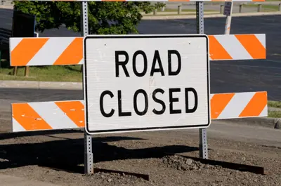 Road closed signage with blockades